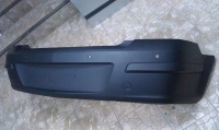 Бампер задний Астра H (2006-2015), седан, для парктроников.